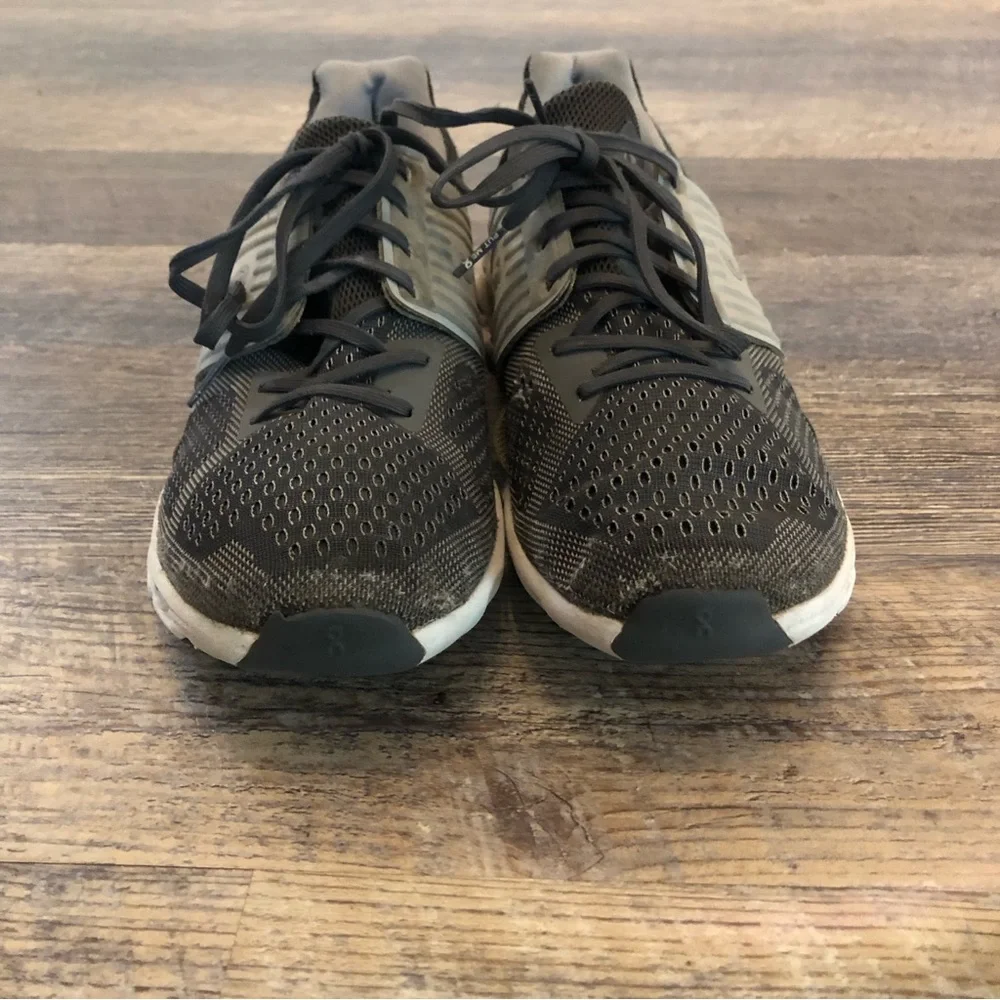 On cloud tennis shoes used condition.  Has some holes,pictures& slits on bottom
